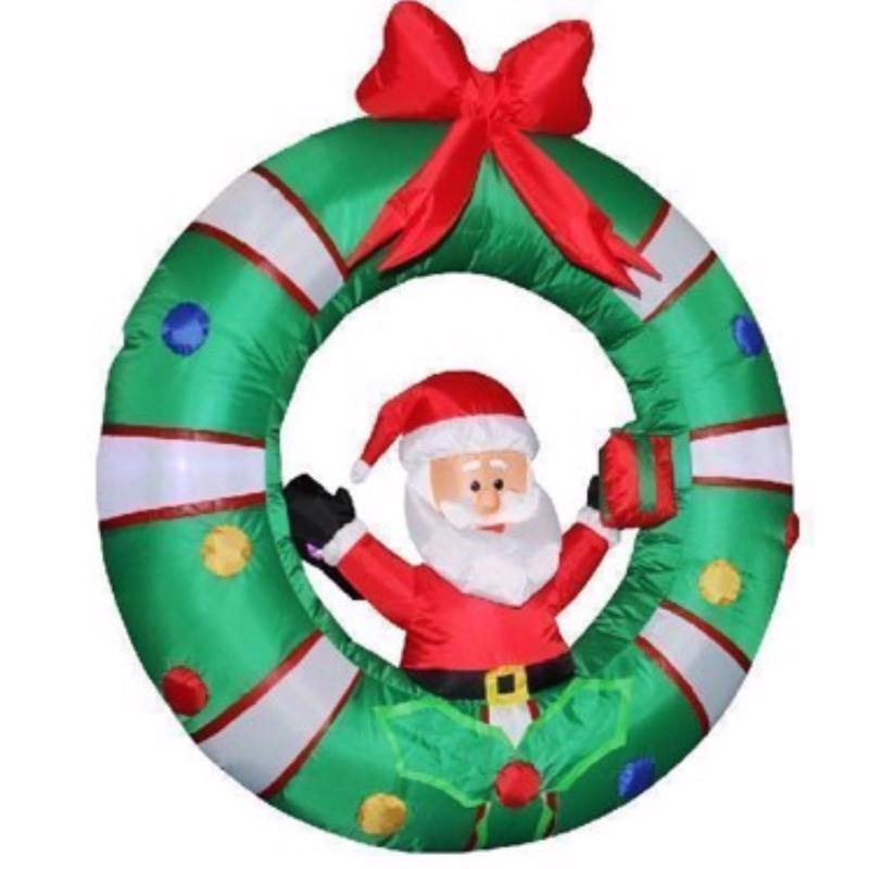 CELEBRATIONS - Celebrations Santa in Wreath 4 ft. Inflatable